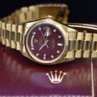 ROLEX DAY-DATE REF. 18038 BURGUNDY STELLA DIAL QABOOS