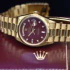 ROLEX DAY-DATE REF. 18038 BURGUNDY STELLA DIAL QABOOS