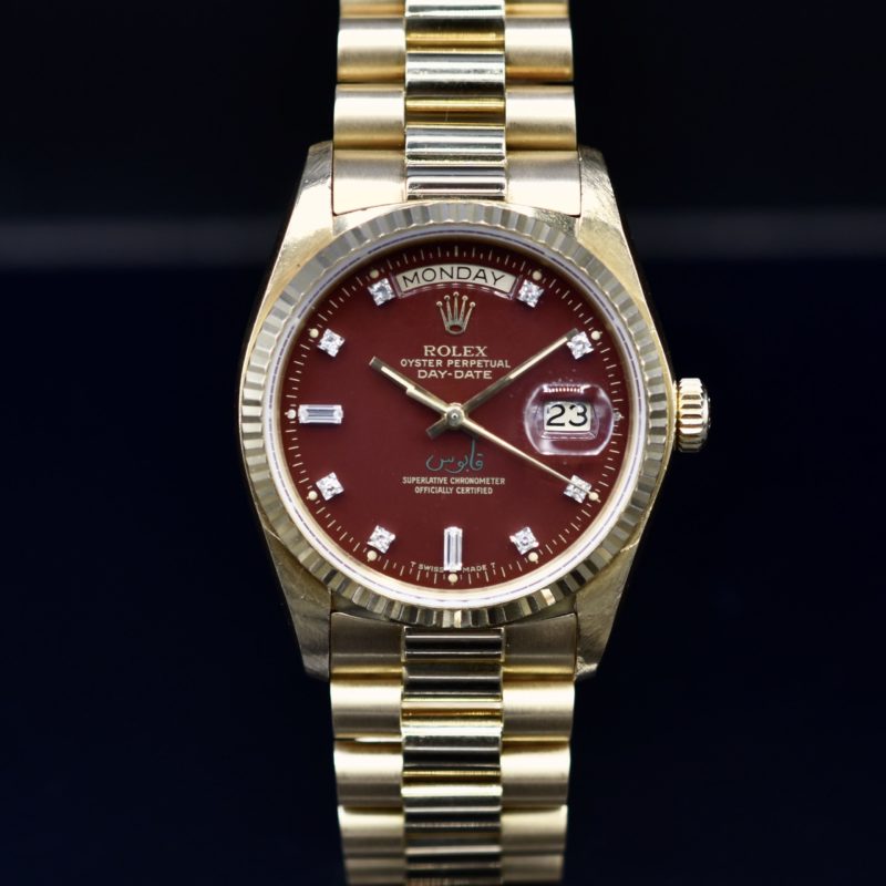 ROLEX DAY-DATE REF. 18038 BURGUNDY STELLA DIAL QABOOS