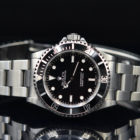 ROLEX SUBMARINER REF. 14060 WITH PAPERS