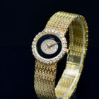 PIAGET LADY’S YELLOW GOLD ONYX AND DIAMONDS