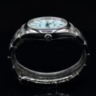 ROLEX OYSTER PERPETUAL 41 BLUE TURQUOISE DIAL REF. 124300 BOX AND PAPERS