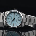 ROLEX OYSTER PERPETUAL 41 BLUE TURQUOISE DIAL REF. 124300 BOX AND PAPERS