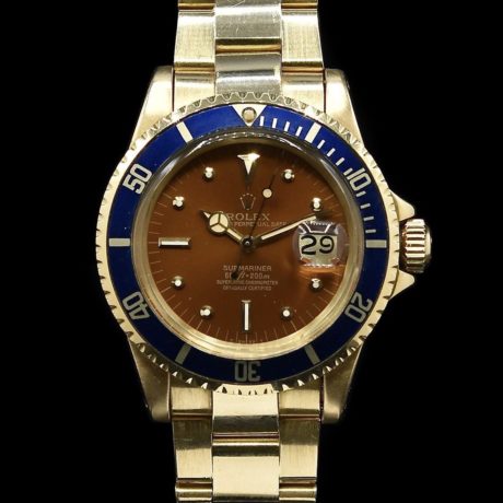 ROLEX SUBMARINER GOLD REF. 1680/8 TROPICAL DIAL BOX AND PAPERS