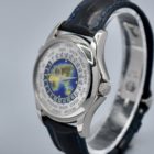 PATEK PHILIPPE WORLD TIME CLOISONEE DIAL REF. 5131G BOX AND PAPERS
