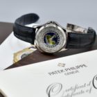 PATEK PHILIPPE WORLD TIME CLOISONEE DIAL REF. 5131G BOX AND PAPERS