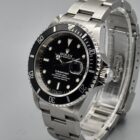 ROLEX SUBMARINER DATE REF. 16610 BOX AND PAPERS.