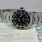 ROLEX SUBMARINER DATE REF. 16610 BOX AND PAPERS.