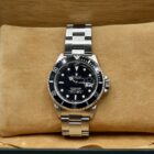 ROLEX SUBMARINER DATE REF. 16610 BOX AND PAPERS.