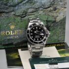 ROLEX SUBMARINER DATE REF. 16610 BOX AND PAPERS.