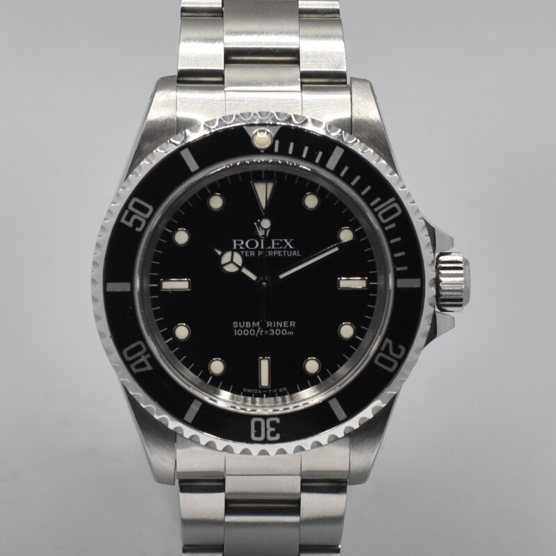 ROLEX SUBMARINER NO DATE REF. 14060 BOX AND PAPERS.