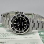 ROLEX SUBMARINER NO DATE REF. 14060 BOX AND PAPERS.