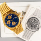 BREITLING CHRONOMAT YELLOW GOLD REF. 81950 WITH PAPERS