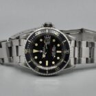 ROLEX SUBMARINER RED REF. 1680 BOX AND PAPERS