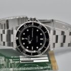 ROLEX SUBMARINER REF. 14060M BOX AND PAPERS