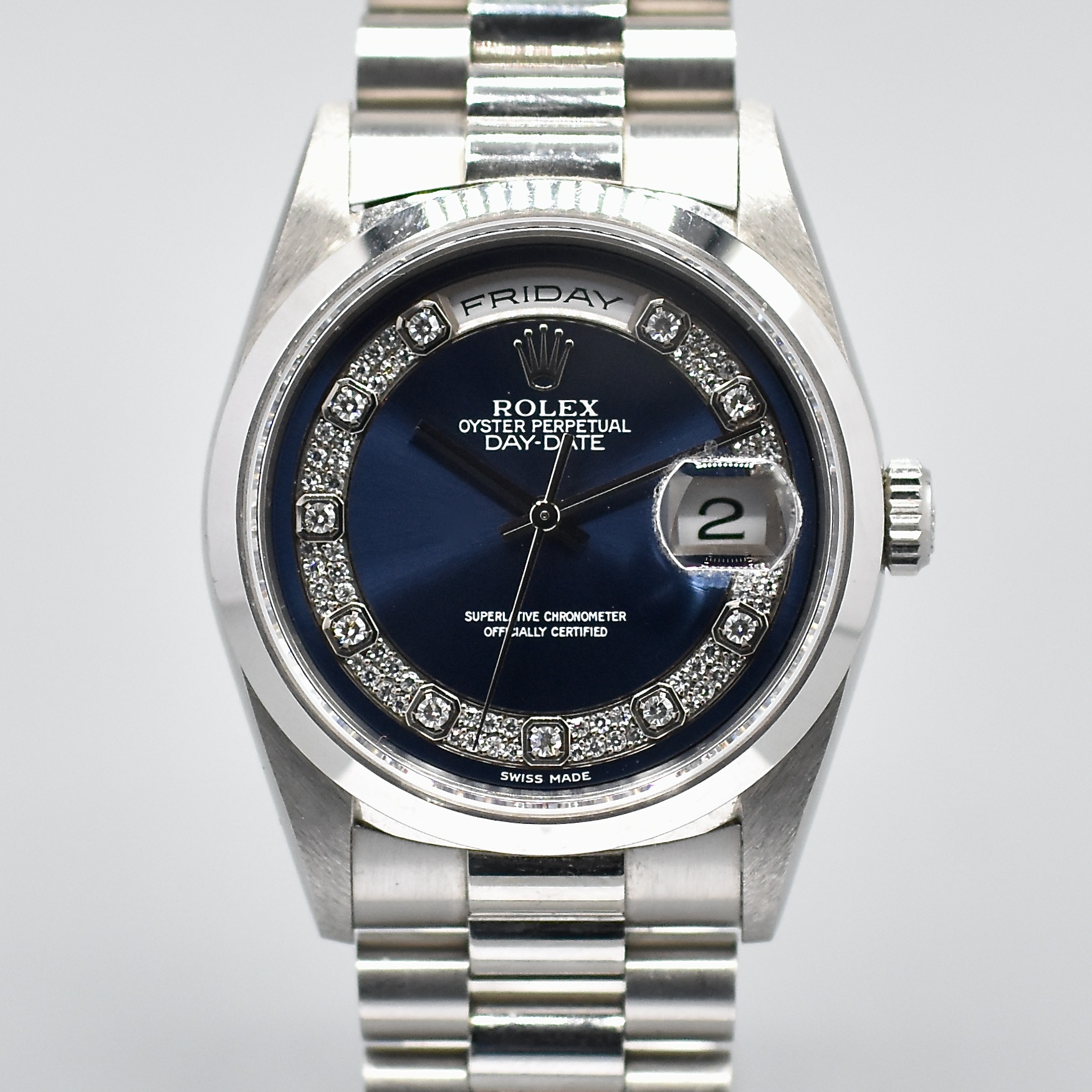 ROLEX DAY-DATE BLUE MYRIAD DIAL PLATINUM REF. 18206 BOX AND PAPERS