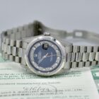 ROLEX DAY-DATE BLUE MYRIAD DIAL PLATINUM REF. 18206 BOX AND PAPERS