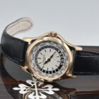 PATEK PHILIPPE WORLD TIME REF. 5110R WITH BOX AND EXTRACT FROM THE ARCHIVES