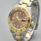 ROLEX GMT MASTER II REF. 16713 « TIGER EYE » STEEL AND GOLD FULL SET