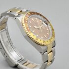 ROLEX GMT MASTER II REF. 16713 « TIGER EYE » STEEL AND GOLD FULL SET