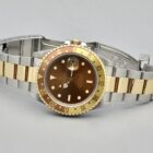 ROLEX GMT MASTER II REF. 16713 « TIGER EYE » STEEL AND GOLD FULL SET