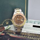ROLEX GMT MASTER II REF. 16713 « TIGER EYE » STEEL AND GOLD FULL SET