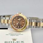 ROLEX GMT MASTER II REF. 16713 « TIGER EYE » STEEL AND GOLD FULL SET