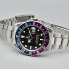 ROLEX GMT MASTER LONG E REF. 1675 FUCHSIA BEZEL BOX AND PAPERS