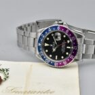 ROLEX GMT MASTER LONG E REF. 1675 FUCHSIA BEZEL BOX AND PAPERS