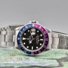 ROLEX GMT MASTER LONG E REF. 1675 FUCHSIA BEZEL BOX AND PAPERS